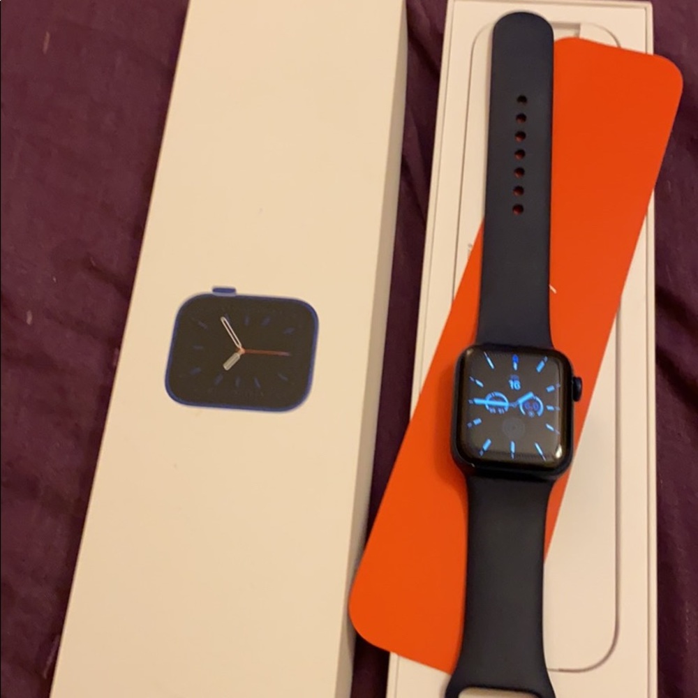 A iPhone 6series watch and a Louis Vuitton wallet